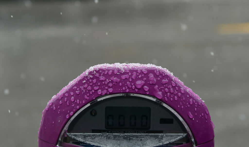 Moisture accumulates on a parking meter